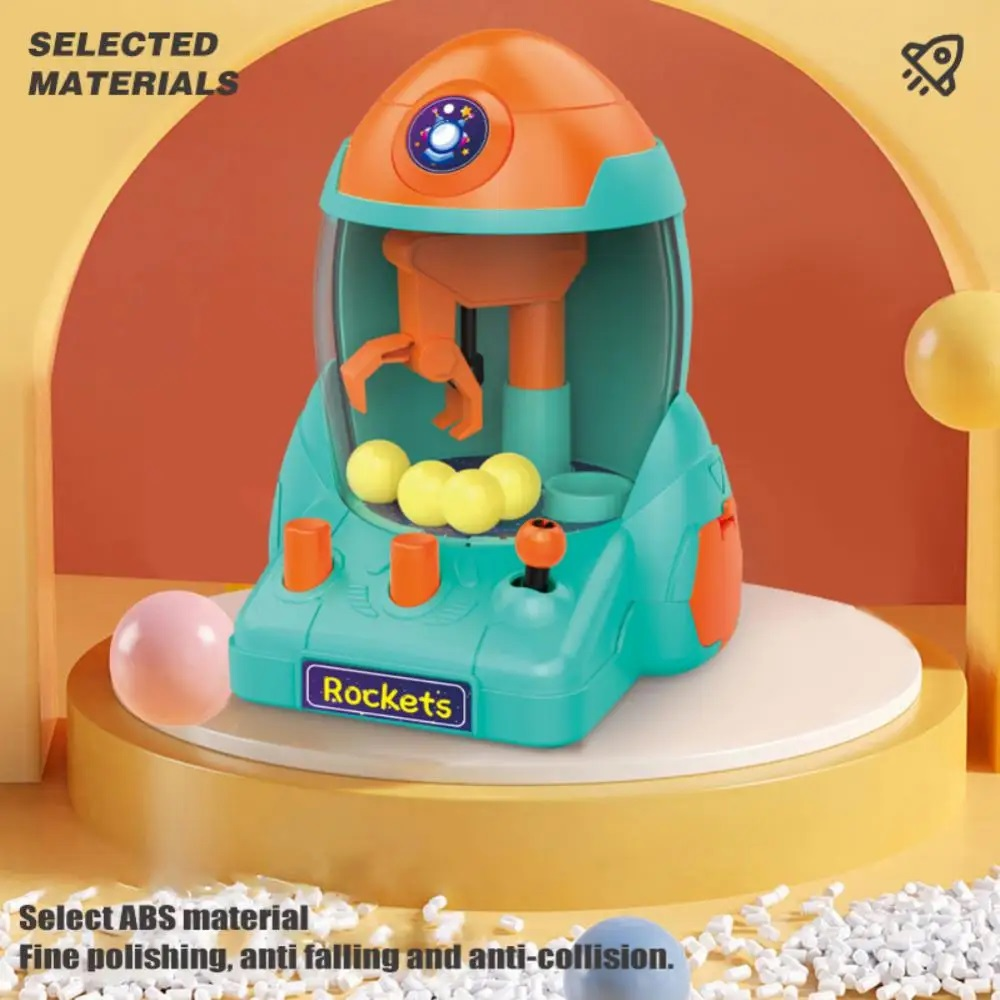 Mini Mquina de Pegar Bolinhas Formato de Foguete com Garra e Bolas